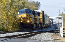 freight train passes thru city