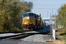 freight train passes thru city 65