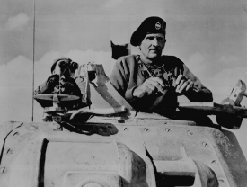 General Bernard L Montgomery watches his tanks move up