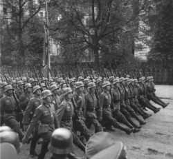 German troops parade through Warsaw