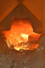 glowing red molten steel at foundry