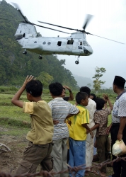 Helicopter lifts off from village