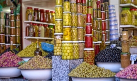 jars pickled olives on a traditional Moroccan market photo