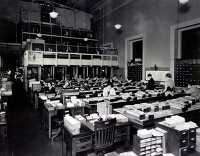 Librarians working with catalog cards in the Processing Departme