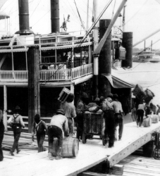 Loading a Mississippi River steamer at New Orleans
