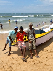 Locals sitting on Boats Goa India