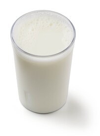low-fat milk in clear glass