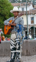 man with guitar wearing traditional costumes cuzco peru 001
