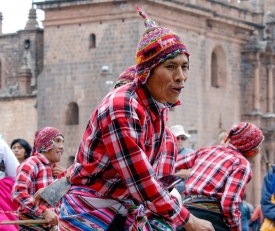 men wearing colorful traditional costumes cusco peru 006