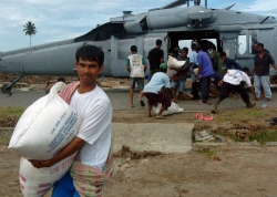 Navy delivers supplies to tsunami victims sumatra