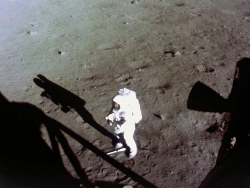 neil armstrong with his gold visor raised and face visible works