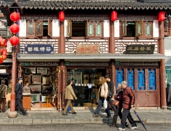 people-walking-near-shops-old-town-shanghai-china