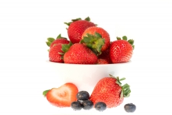 photo image bowl of blueberries strawberries on white background