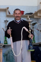 photo man holding hookah smoking water pipes image 5123 2