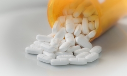 Prescription Pain Medication With Prescription Bottle Photo 