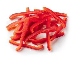 Red bell peppers thinly sliced on white background