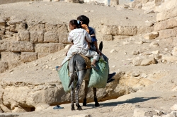 Riding donkey near Pyramids Giza Egypt Photo 5407A