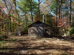 rustic cabins at the hickory ridge living history museum in boon