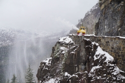 snnow equipment clearing roads in glacier national park