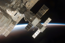 Soyuz from a window on the International Space Station