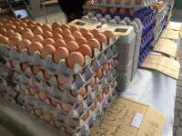 Stack of organic eggs ready for sale