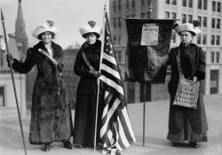 Suffragettes with flag