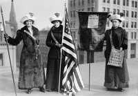 Suffragettes with flag