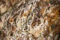 swirling pattern of rocks closeup