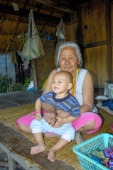 Thai Grandmother holding child