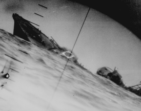 Torpedoed Japanese destroyer photographed through periscope
