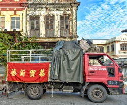 truck in front of old building georgetown malaysia 7673e