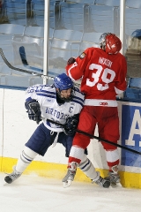 two hockey players against wall
