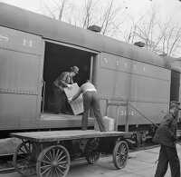 unloading express from train