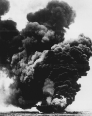 USS BUNKER HILL burning after Jap suicide attack