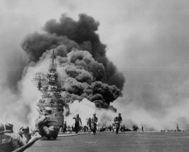 USS BUNKER HILL hit by two Kamikazes
