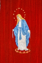 Virgin Mary on Red Velvet drapery