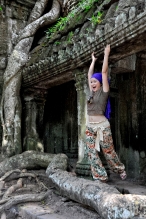 Woman Posing along ruins Angor Wat Cambodia