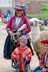 women child in traditional clothing with alpaca 012