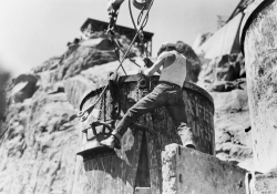 Workman attaching cables boulder dam 1934