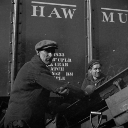 Workmen in a coal yard Historical Photo