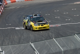 yellow car on track at rally race 099