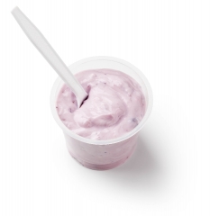 yogurt in cup with spoon