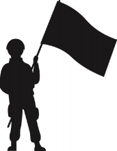 silhouette of military personel holding flag