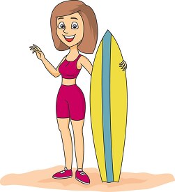 woman on beach holding surf board 548