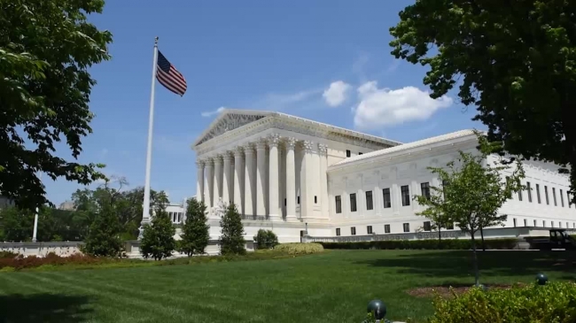 flag waving over the us supreme court