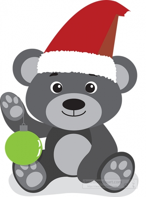 cute brown baby bear holding ornament wearing red christmas hat 