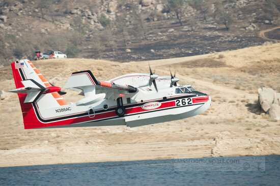 Aerial scooper plane scoops up water at lake isabella 2