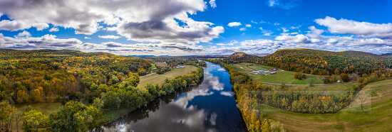 Aerial view of river along farm in massachusets