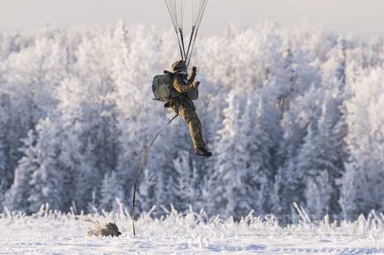 Air Force special warfare Airmen and Army paratroopers conduct a
