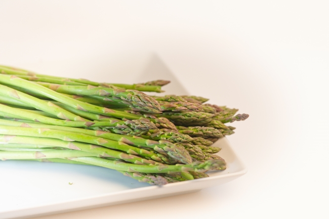 asparagus on white plate photo